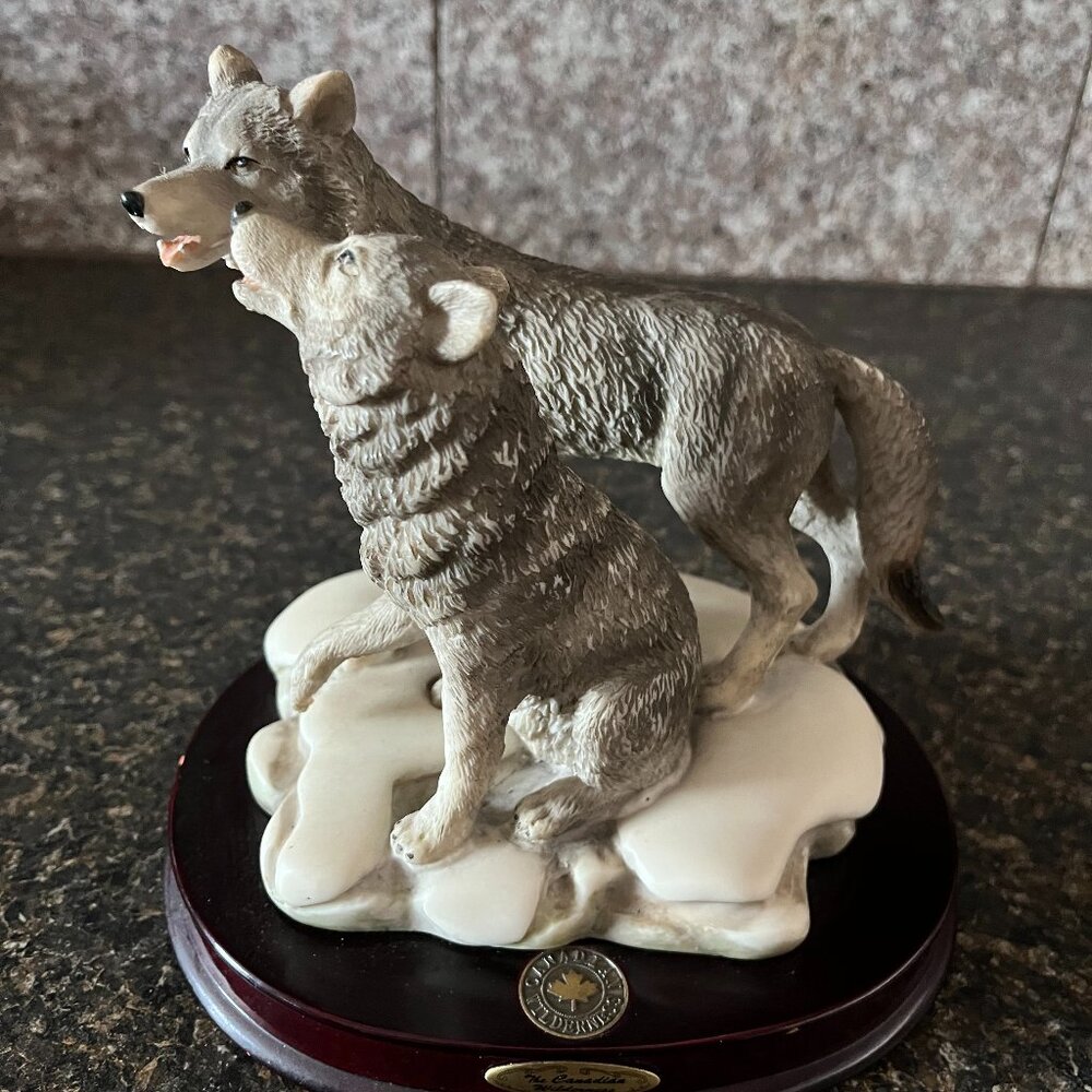 The Canadian Wilderness Vintage 2 wolves on wooden base